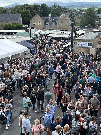 Crowds at the market looking at stalls.