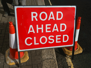 Road Ahead Closed Sign